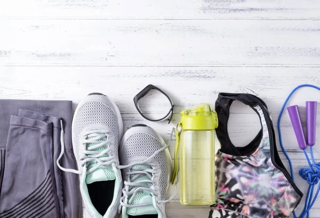 flat lay image of workout accessories, decorative image for an article about fitness essnetials
