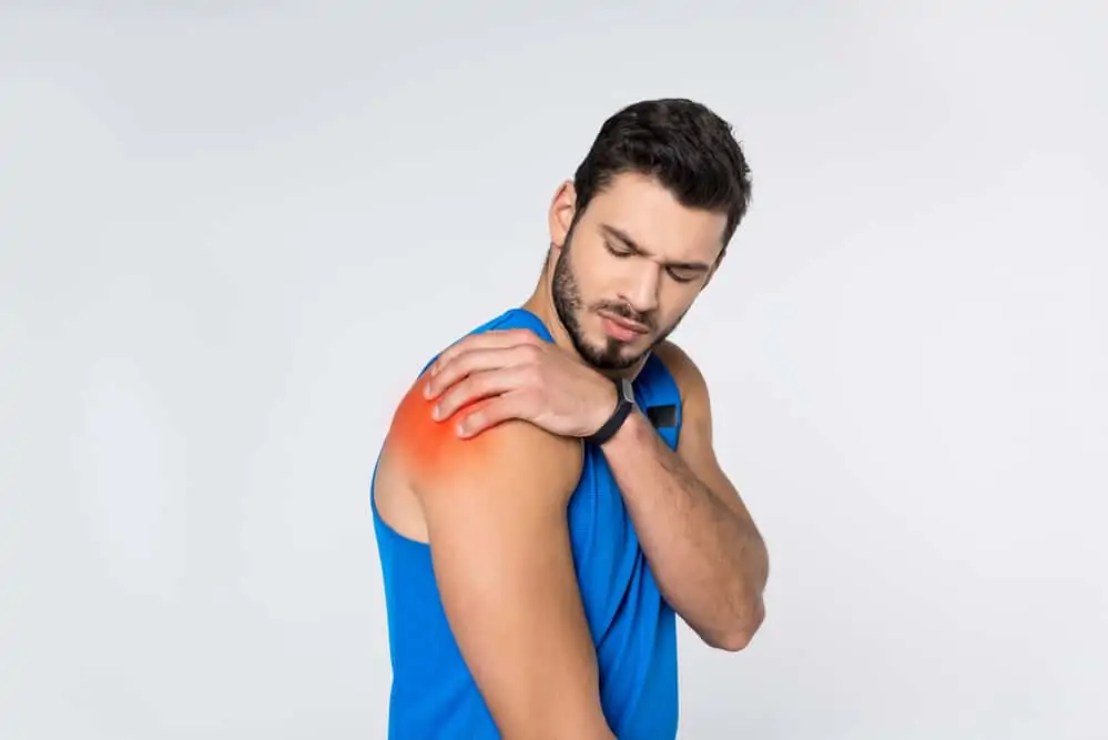 man working out with shoulder pain - exercises to avoid with a rotator cuff injury