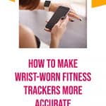 woman looking at her fitness watch with text overlay how to make wrist worn fitness trackers more accurate